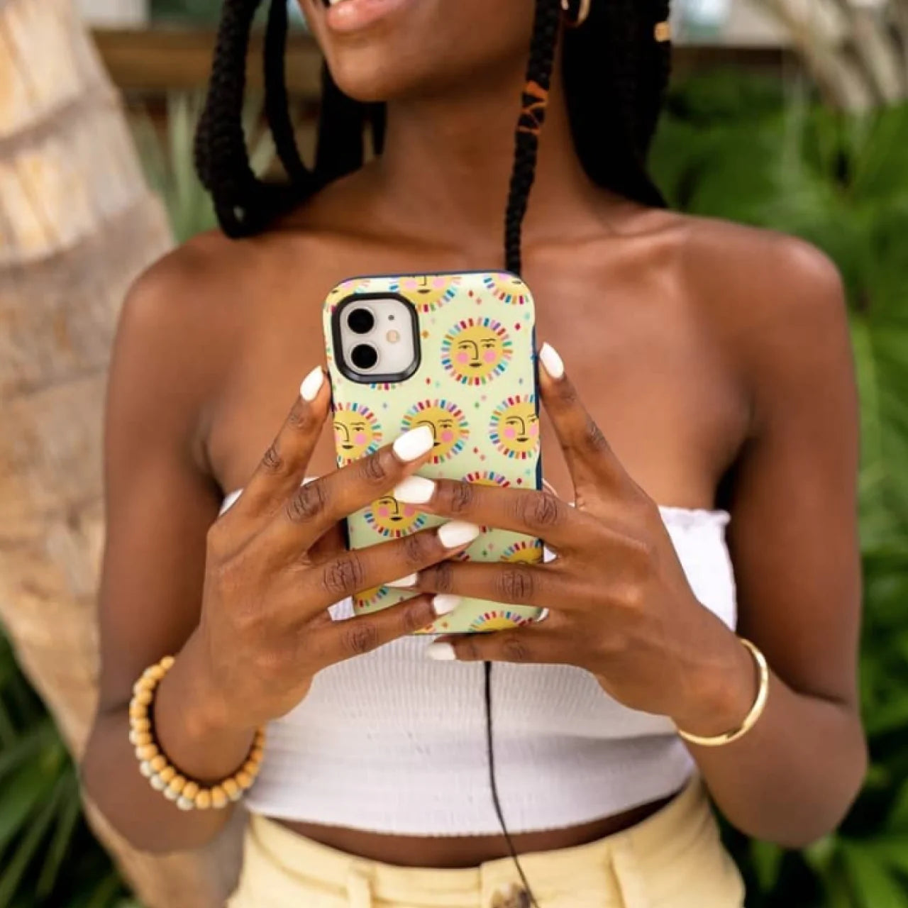 PLUMA protective phone cases and accessories arranged in natural light